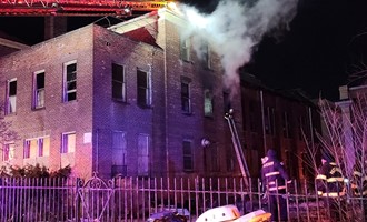 PATERSON FIREFIGHTERS FIGHT BLAZE IN FORMER HIGH SCHOOL