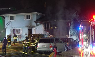 CLIFTON GARAGE FIRE EXTENDS TO HOUSE