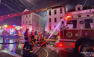 Paterson 5th alarm for well involved row of homes