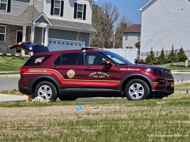 Assistant 80 of the Lower Macungie F. D. on the scene of a dwelling fire