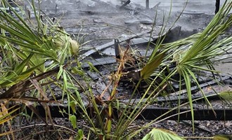 Crews Battle Fully Involved Shed Fire in Remote Area