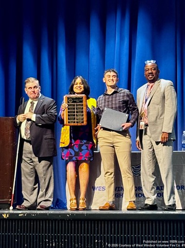 Millenger Receives Community Service Award