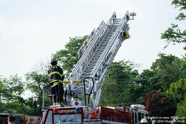 Firefighters Investigate Fire on Roof of Byram Quick Check