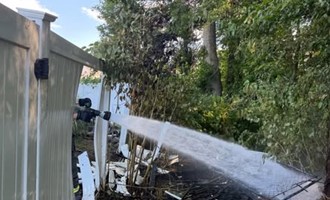 Quick Firefighter Action Stops Brush Fire from Reaching Structure