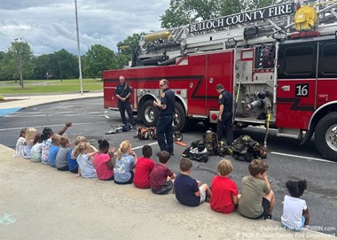 Firefighters Engage Young Minds with Safety Lessons at Summer Camp