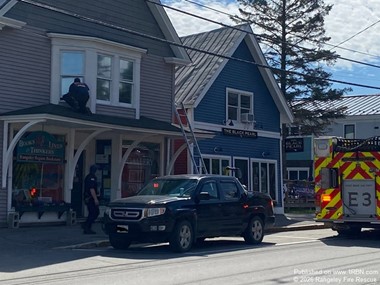 Firefighters Rescue Dog Stranded on Rooftop in Rangeley