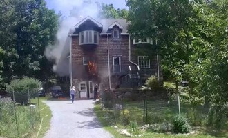 Firefighters Control Three-Story House Fire in 15 Minutes