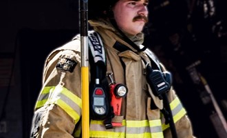 Quick Action by Neighbor and Crews Limits Vehicle Fire Extension