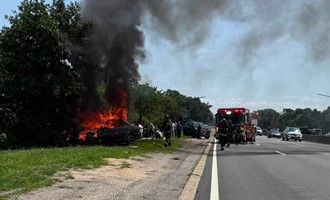 Firefighters Use Power Saws During Vehicle Fire Overhaul
