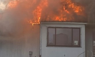 Commercial Fire Destroys Office Building, Crews Save Adjacent Structure