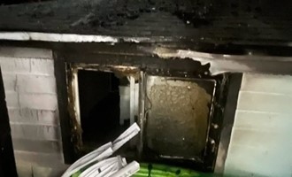 Two-Story Structure Fire Contained with Extension to Nearby Home