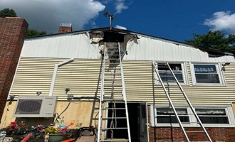 Flames Quashed in Minutes: 8-Town Fire Team Saves Auburn Pownal Road Home