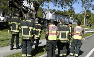 Truck ends up in tree after MVC