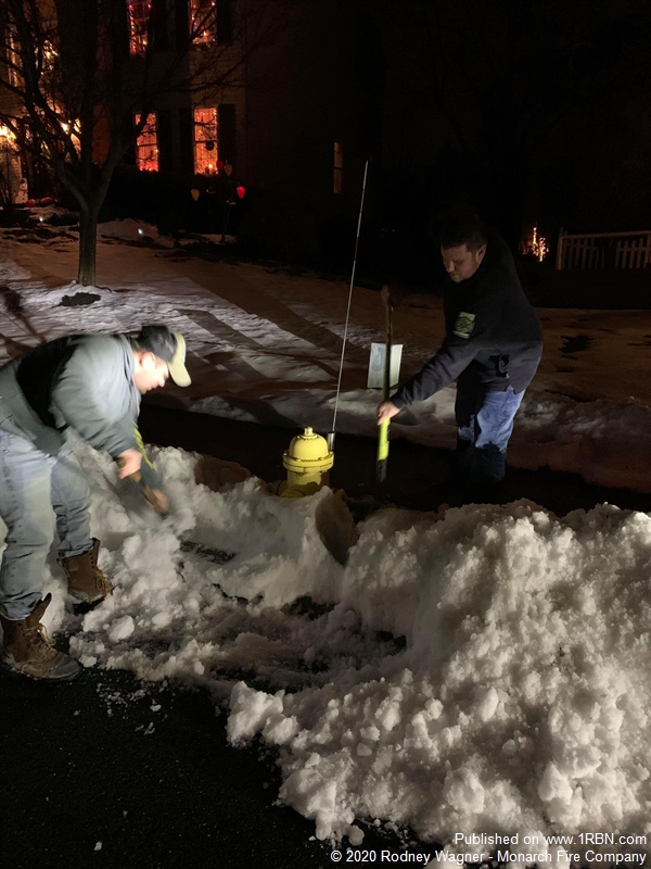 Monarch Firefighters Clear Hydrants