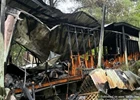 Unattended Cooking Fire Destroys Mobile Home, Nearby Trailer Saved