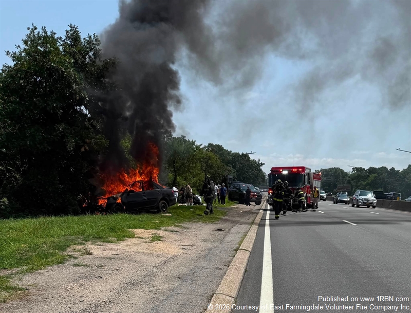 Firefighters Use Power Saws During Vehicle Fire Overhaul