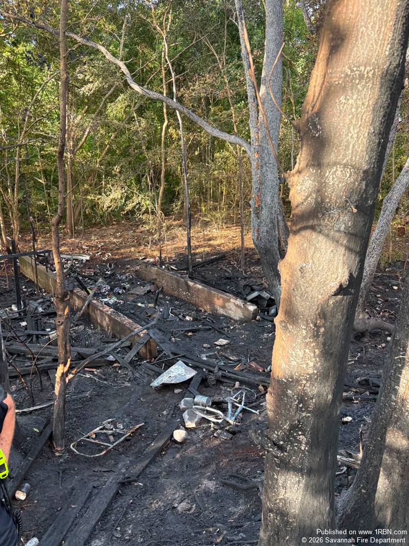 Crews Extinguish Vacant Structure Fire in Wooded Area