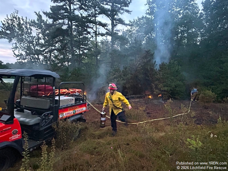 Burning Beneath the Pines: Lightning-Sparked Brush Fire Forces Deep Woods Operation in Litchfield