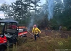 Burning Beneath the Pines: Lightning-Sparked Brush Fire Forces Deep Woods Operation in Litchfield